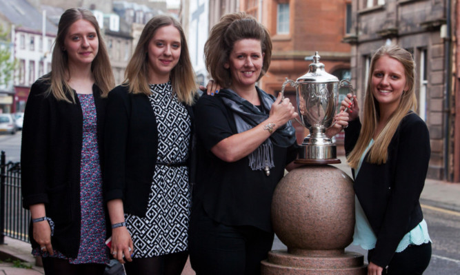 Denise Webster with daughters Ellie, Thea and Devon.