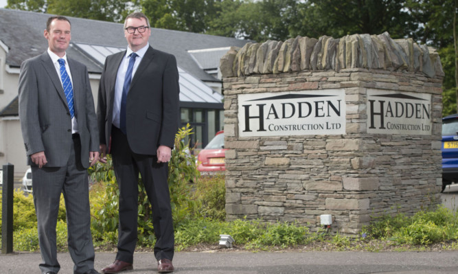 CEO Scott Hadden, right, with Andrew McKie of Bank of Scotland at Haddens new HQ.