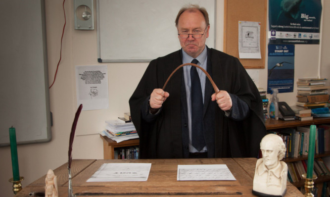 English head Andrew Shanks demonstrates the belt.