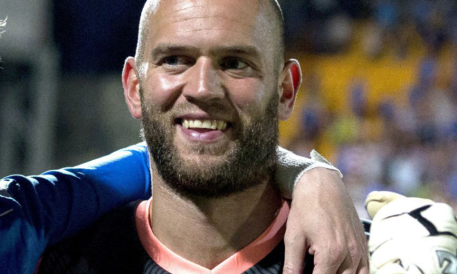 Saints keeper Alan Mannus is expecting a challenge from young Zander Clark this season.