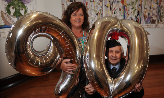 Fife Cultural Trust assistant Wendy Vallance and 103-year-old Jimmy Sinclair.