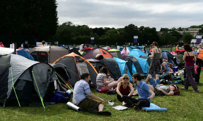 Tennis fans set up their tents ahead of the championship.