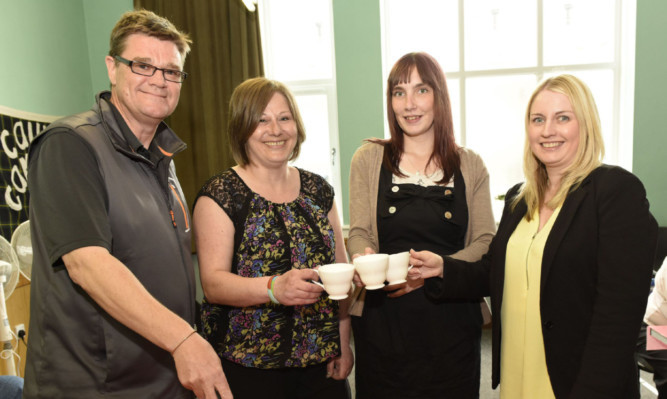 Volunteers Robert Marshall, Jaime Aitken and Natalie Bruce with development officer Laura Ogilvie from the Angus Alcohol and Drugs Partnership.