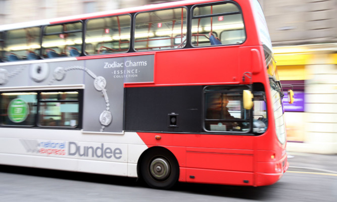 Kris Miller, Courier, 11/08/14. Picture today shows a general view of a National Express Bus in Seagate Dundee for files.