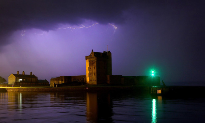 Broughty Ferry Castle in a dramatic storm.