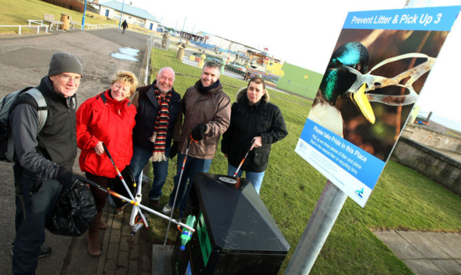 At the launch of the litter prevention project for the West Links and Arbroath are, from left, Rod McLeod of East Haven Residents Association, Wendy Murray, head of East Haven Residents Association, and councillors David Fairweather, Donald Morrison and Ewan Smith.