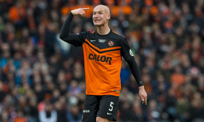 Jaroslaw Fojut in action for Dundee United.