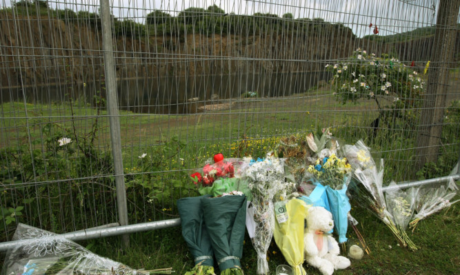 Tributes left at Prestonhall Quarry after the death of 18-year-old John McKay.