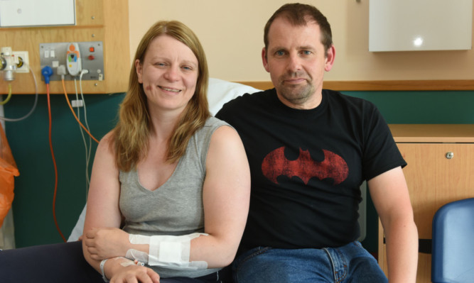 Deborah broke her arm but hopes to be home with partner Barry today.