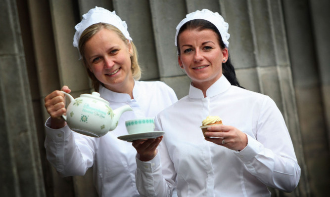 Gosia Markowska and Gemma McKenzie are two of the students helping to run the tearoom.