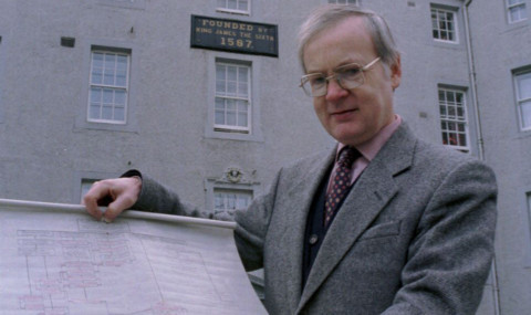 Graham Mackenzie, clerk of the trustees, holds one of the Cairnie family trees.
