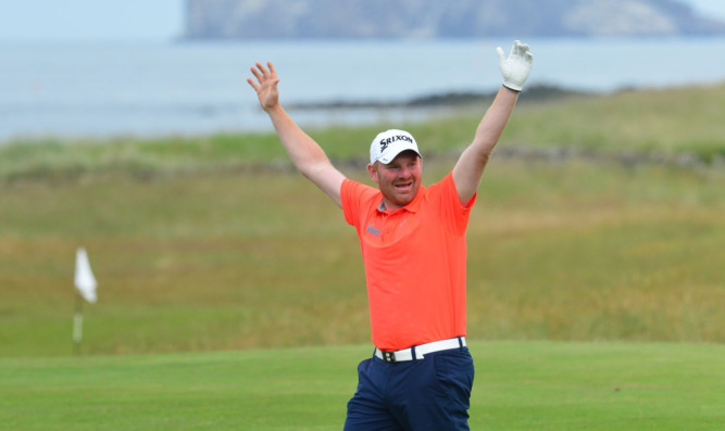 Gareth Wright celebrates his hole in one on his way to qualifying for the Scottish Open.