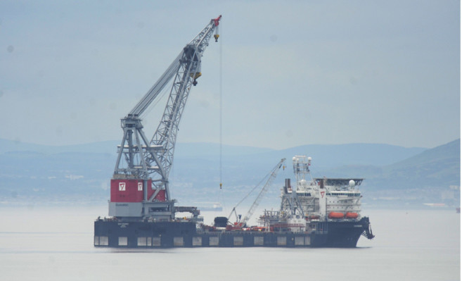 The huge maritime crane anchored off the Fife coast.