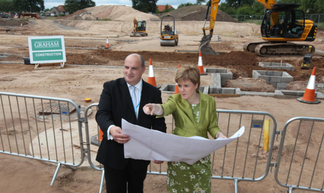 First Minister Nicola Sturgeon with NHS Fife chief executive Paul Hawkins on the new £4.4 million construction site at Stratheden Hospital.