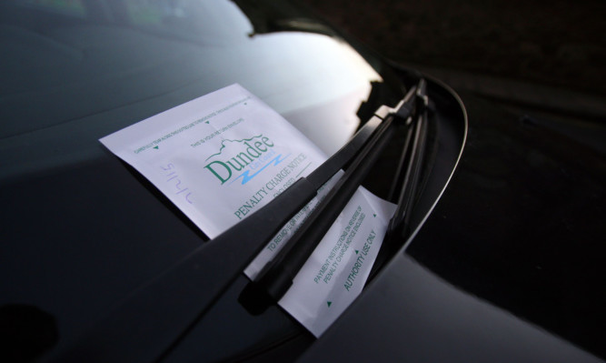 Kris Miller, Courier, 07/02/15. Picture today shows general view of a parking ticket on a car in Dundee City Centre for files.