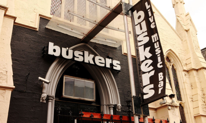 The attack happened at the Buskers music bar.