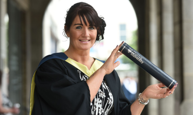 Mum-of-four Amanda Aitken has graduated with a 2:1 in Sports and Exercise Nutrition.