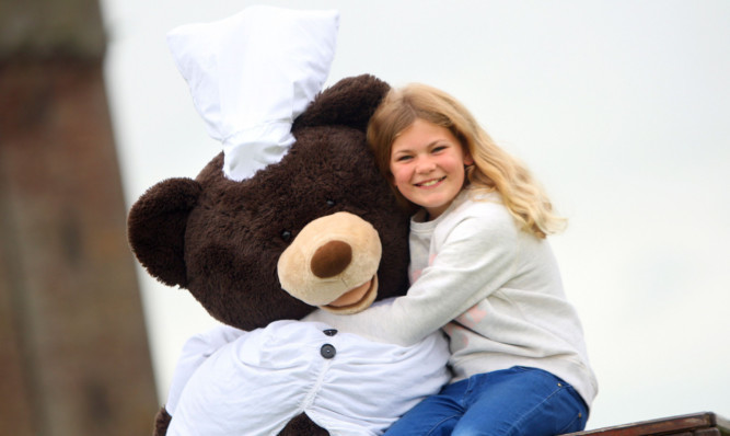 Heidi Crowhurst and one of the bears.