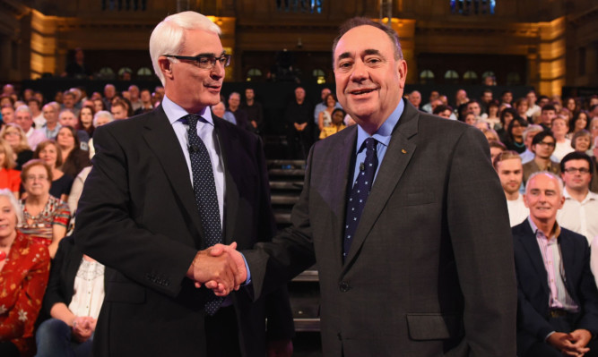 Alex Salmond and Alistair Darling at a live BBC TV referendum debate in Glasgow last August.