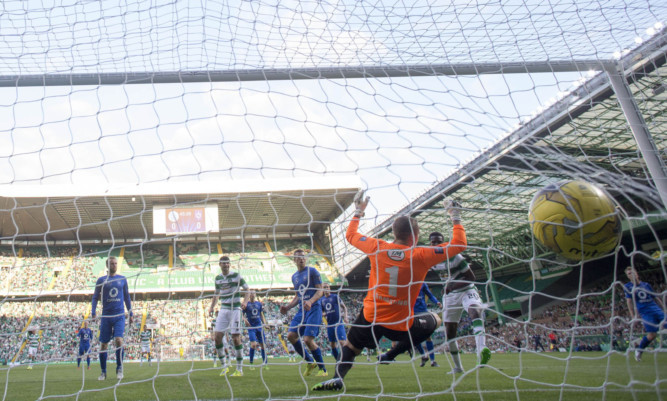 Dedryck Boyata scores the opening goal for Celtic.