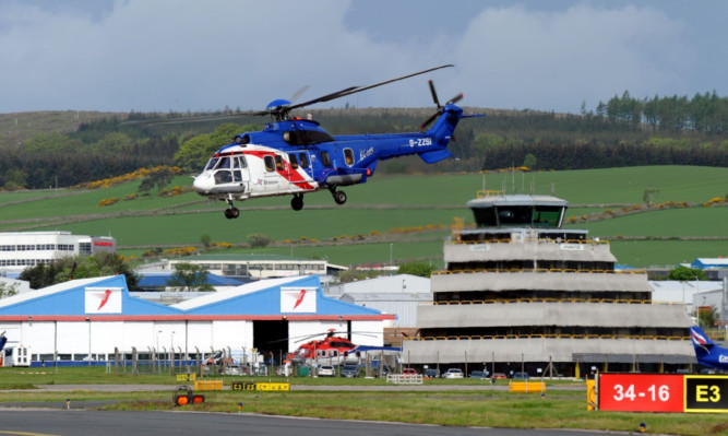 A Bristow helicopter prepares to land at Aberdeen.