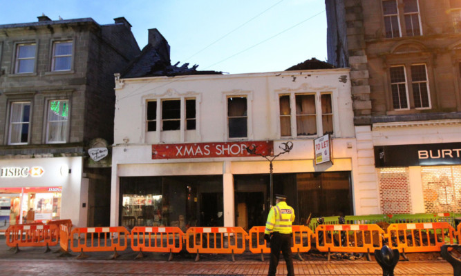The shop was eventually demolished after suffering serious damage in the blaze.