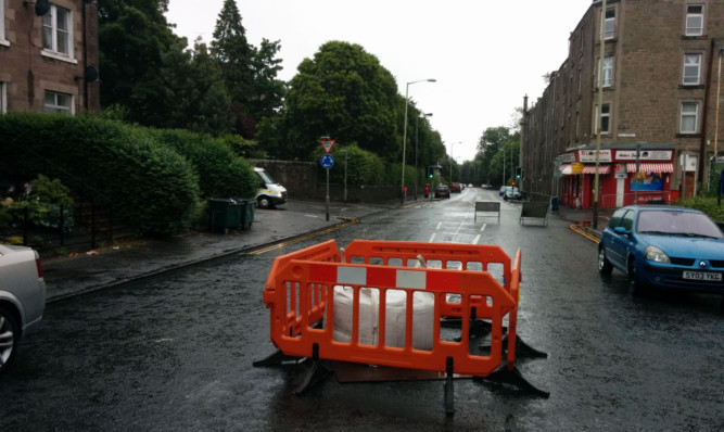 A spokesman for Scottish Water said the issues on Dens Road were caused by a blocked drain.