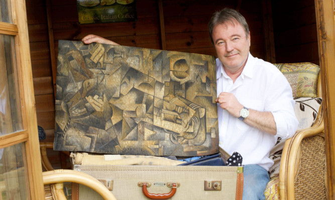 Artist Dominic Currie with the fake Picasso painting which he is putting up for sale online.