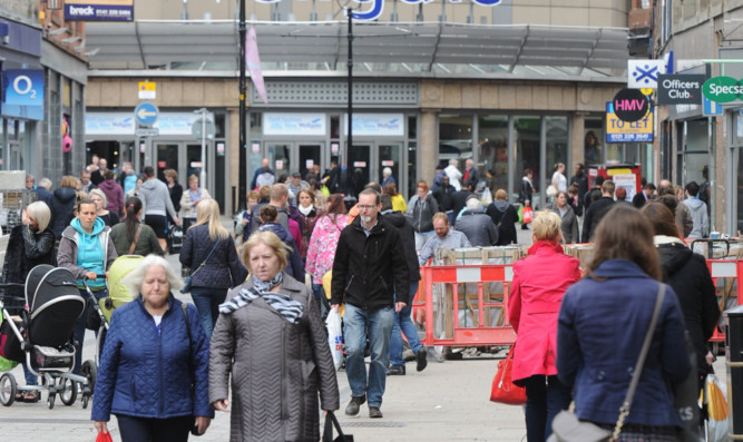 Shoppers outside the Wellgate Centre in Dundee.