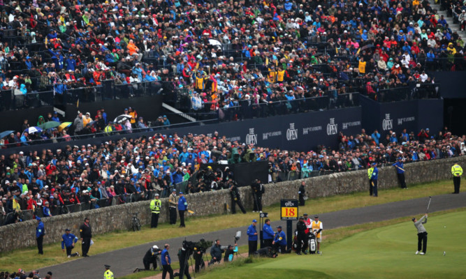 Jordan Spieth tees off on the 18th at St Andrews yesterday.