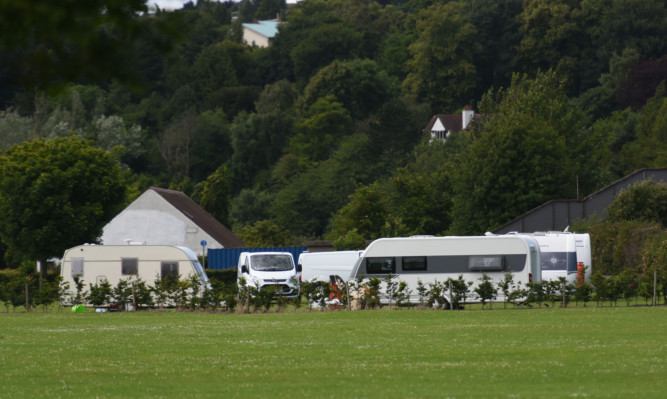 The latest travellers camp on Riverside Drive has raised concerns for airport safety.