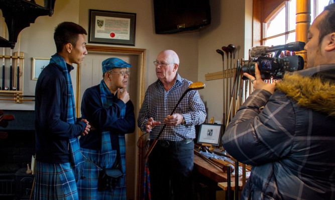 China Golf Channel filming at Simpsons golf shop in Carnoustie.