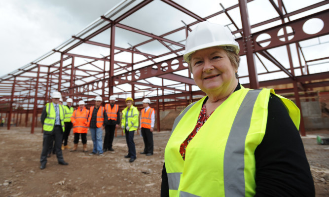Children and learning convener Sheena Welsh at the new Warddykes Primary School in Arbroath with local councillors and contractors.