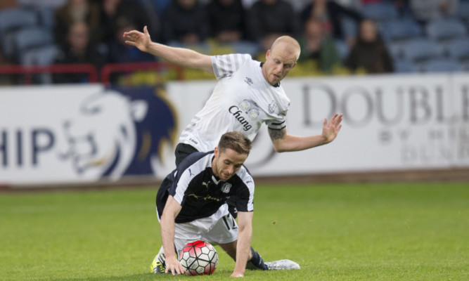 Everton's Steven Naismith (top) battles with Dundee's Nick Ross