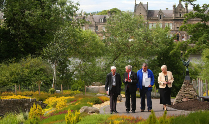 From left: Terry Stott, John Summers, Alan Gray and Provost Liz Grant walking through Rodney Gardens in Perth.