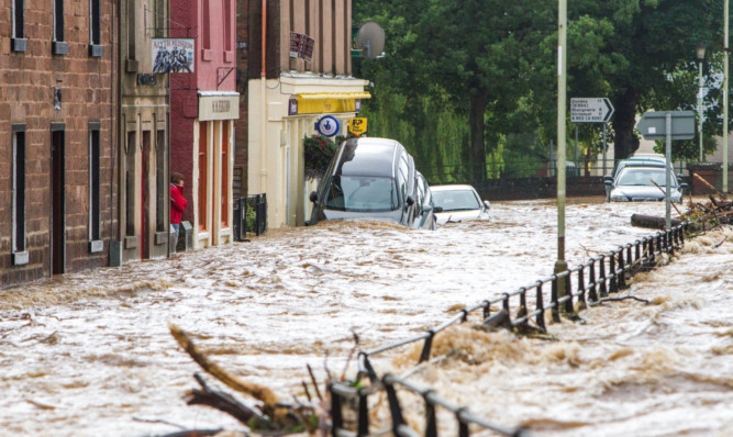 The flooding devastated the town centre.