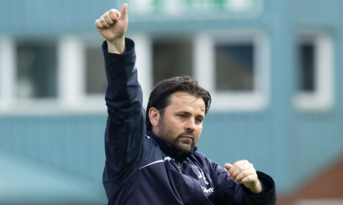 Thumbs up from Paul Hartley at the final whistle.