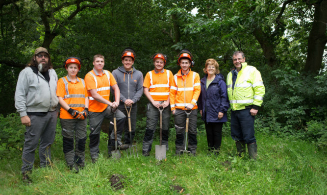 Lorna Ross, steering committee chairman, and project manager George Lawrie, far right, with, from left, Paul Wilson, Nicole Kirkbride, Zack Guild, Callum Duffy, Russell Meldrum and Ryan McEneany.