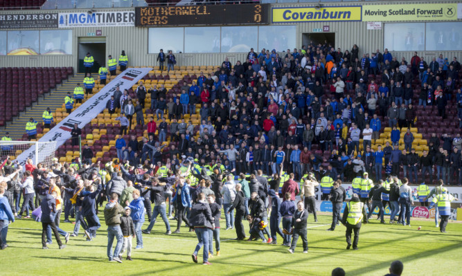 Motherwell fans taunted the Rangers supporters in the stand at the end of the Scottish Premiership play-off.