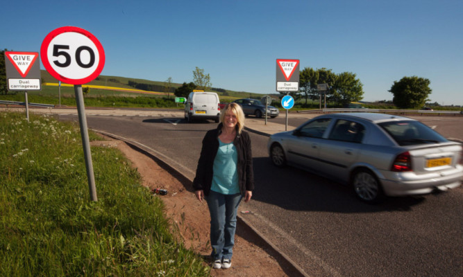 Campaigner Jill Fotheringham at the busy junction at Laurencekirk.