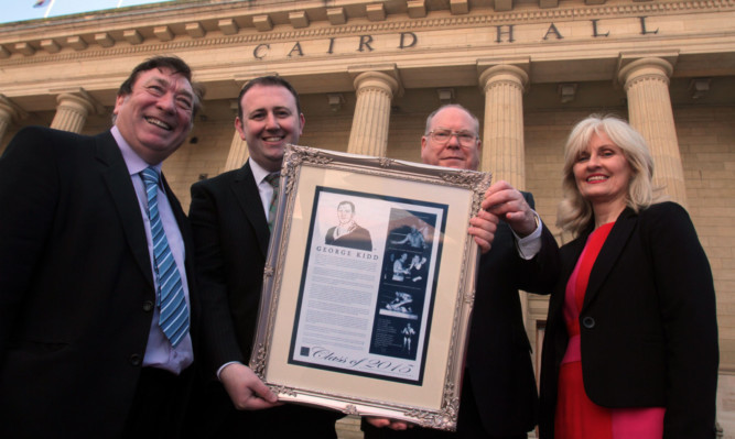 Councillor Len Ironside, wrestling historian Bradley Craig, Lord Provost Bob Duncan and Caird Hall manager Susan Gillan with the plaque to honour George Kidd.