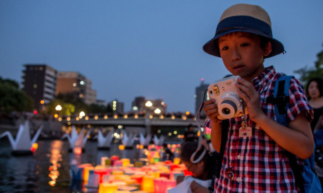 Activities took place this week to commemorate the 70th anniversary of the atomic bombing of Hiroshima at the Hiroshima Peace Memorial Park on August 6, 2015 in Hiroshima, Japan. Japan marks the 70th anniversary of the first atomic bomb that was dropped by the United States on Hiroshima on August 6, 1945. Alex Salmond says the anniversary is a timely reminder of the need to scrap the UK's nuclear weapons.