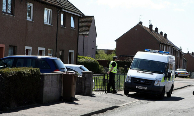 Police outside the house in Fintry.