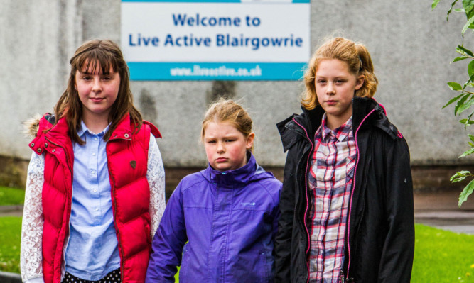 Three of the youngsters who were locked in  Emily Stewart, and sisters Emma and Caitlin Barrie.