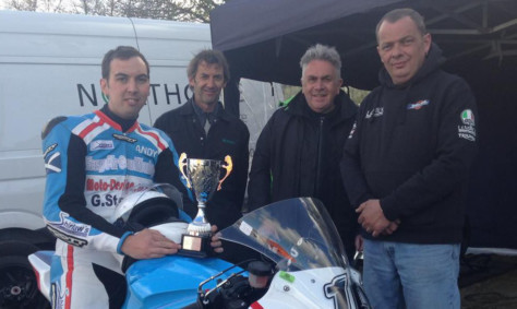 Andy Lawson on his bike with, from left, father Mike Lawson, Roy Shirlaw of Shirlaws Motorcycles and mechanic Gus Urquhart.