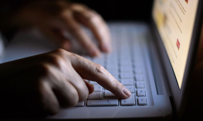 Generic stock photo shows a woman's hands using a laptop keyboard. PRESS ASSOCIATION Photo. Picture date: Tuesday August 6, 2013. Photo credit should read: Dominic Lipinski/PA Wire