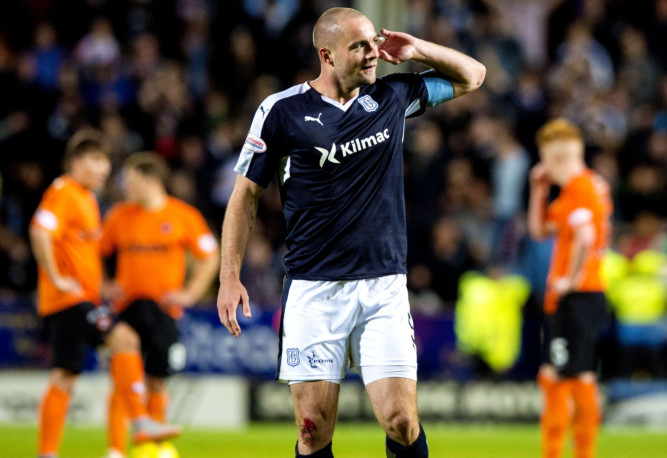 Dundee United and Dundee served up a derby thriller at Tannadice. Blair Spittal scored twice to put United on course for victory, but Greg Stewart and then James McPake (pictured) struck to grab a draw for the Dark Blues.