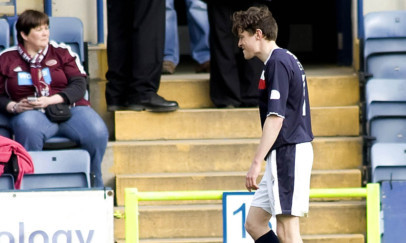 Nicky Riley heads to the stand after his red card.