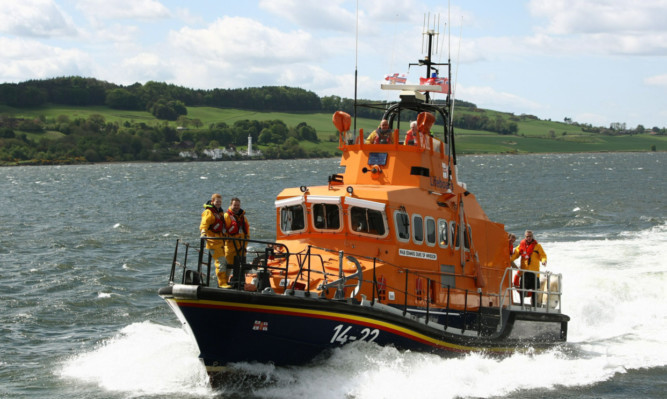 A lifeboat crew in action.