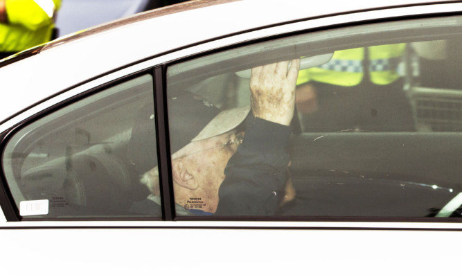 Lord Janner arrives by car at Westminster Magistrates Court in London, to face child abuse charges.